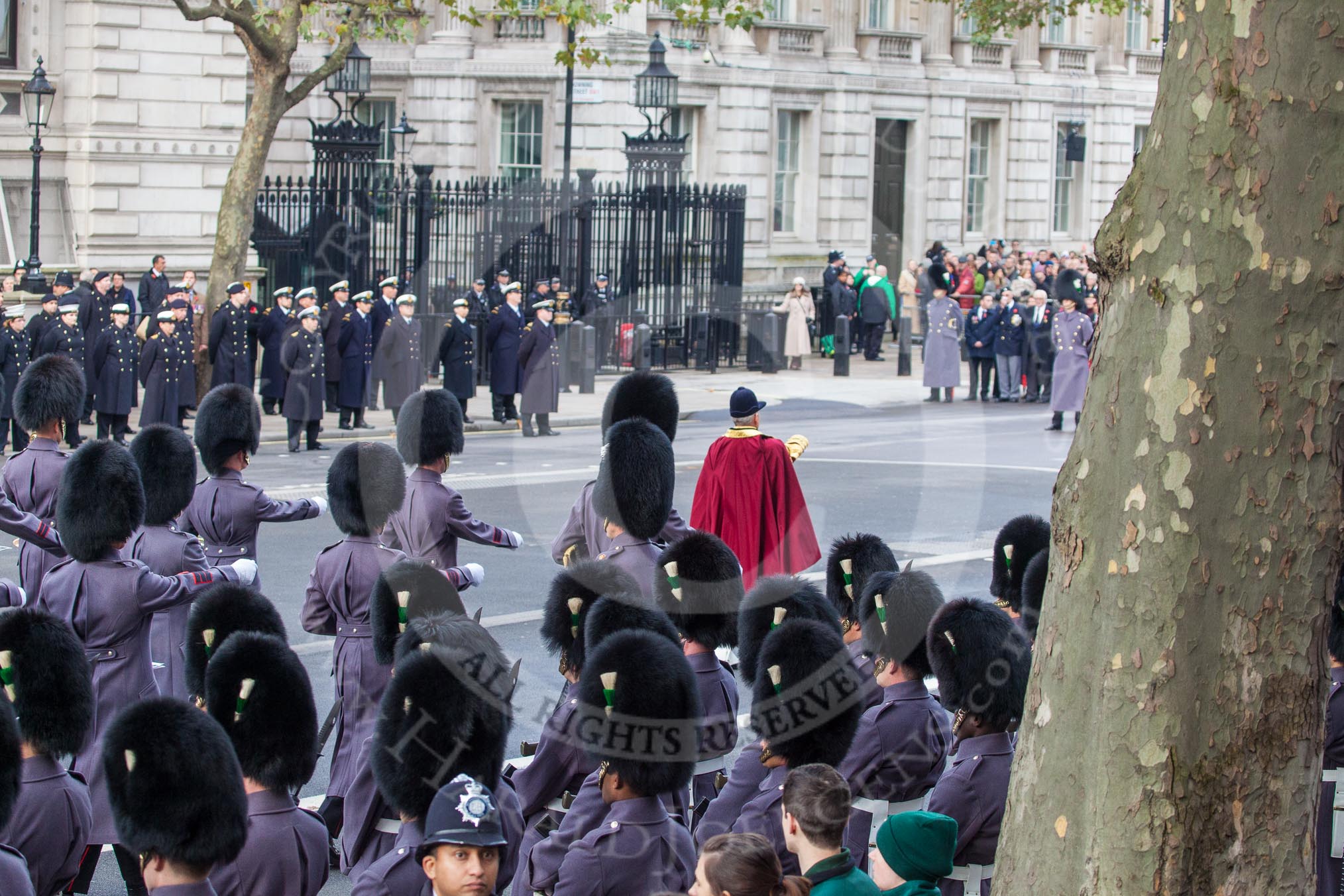 Remembrance Sunday at the Cenotaph in London 2014: The Band of the Coldstream Guards repositions to give way for the veterans for the March Past.
Press stand opposite the Foreign Office building, Whitehall, London SW1,
London,
Greater London,
United Kingdom,
on 09 November 2014 at 11:30, image #315