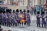 Remembrance Sunday at the Cenotaph in London 2014: Drum Major Stephen Staite, Grenadier Guards, leading another band onto Whitehall.
Press stand opposite the Foreign Office building, Whitehall, London SW1,
London,
Greater London,
United Kingdom,
on 09 November 2014 at 10:29, image #68