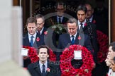 Remembrance Sunday at the Cenotaph in London 2014: The politicians emerging from the door of the Foreign- and Commonwealth Office - Nick Clegg and David Cameron, behind them Nigel Dodds and Ed Milliband.
Press stand opposite the Foreign Office building, Whitehall, London SW1,
London,
Greater London,
United Kingdom,
on 09 November 2014 at 10:55, image #122