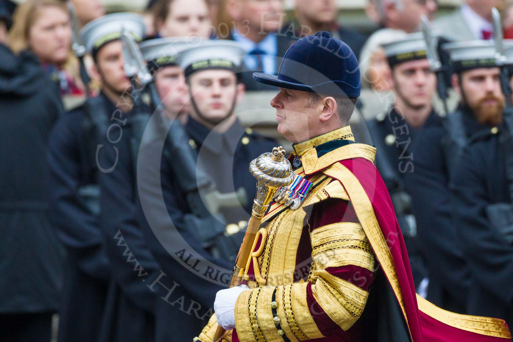 Remembrance Sunday at the Cenotaph 2015: Drum Major Tony Taylor, No. 7 Company Coldstream Guards, leading his band to a new position to make space for the March Past.
Cenotaph, Whitehall, London SW1,
London,
Greater London,
United Kingdom,
on 08 November 2015 at 11:35, image #10