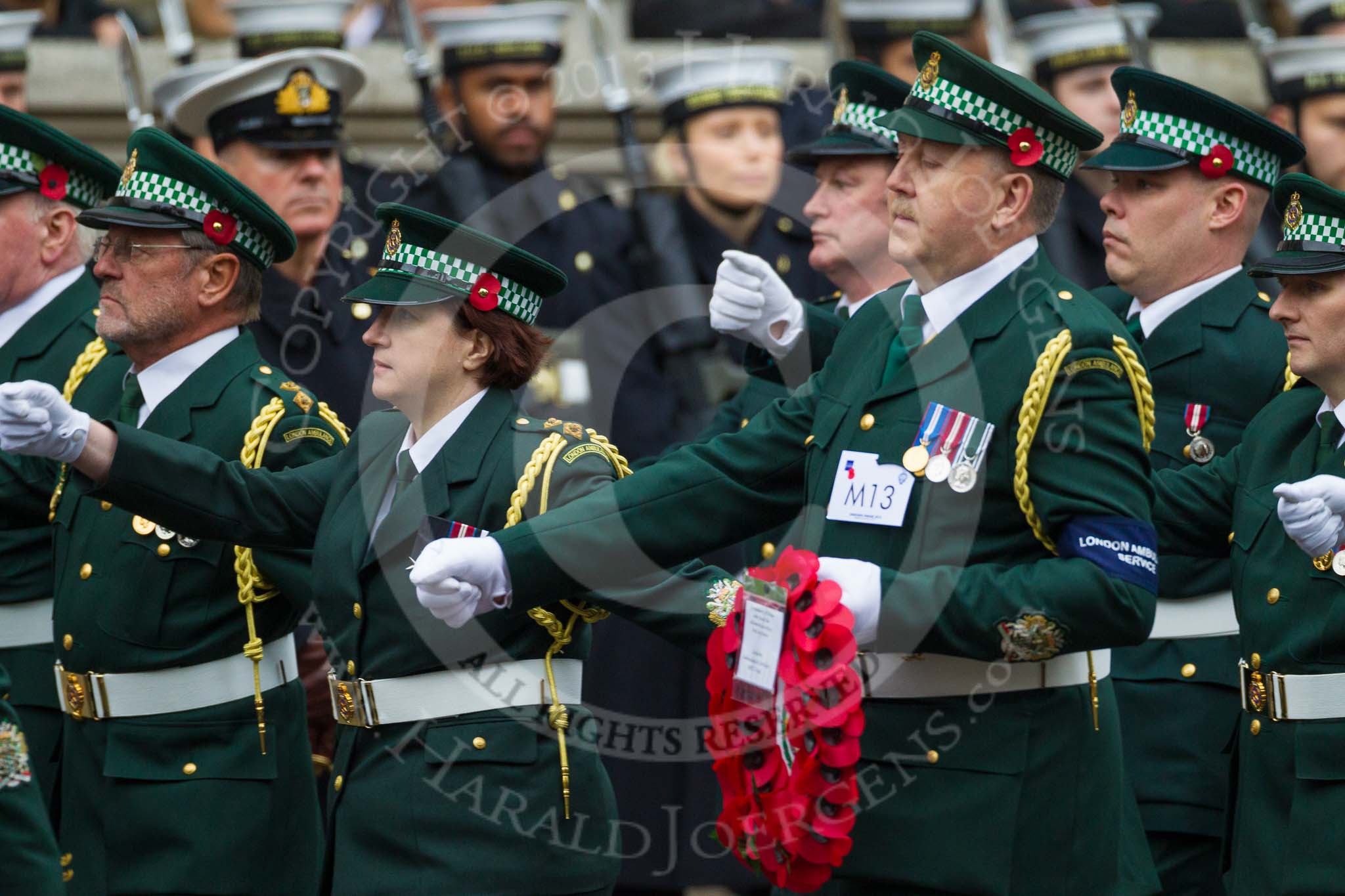 Remembrance Sunday at the Cenotaph 2015: Group M13, London Ambulance Service NHS Trust.
Cenotaph, Whitehall, London SW1,
London,
Greater London,
United Kingdom,
on 08 November 2015 at 12:16, image #1491