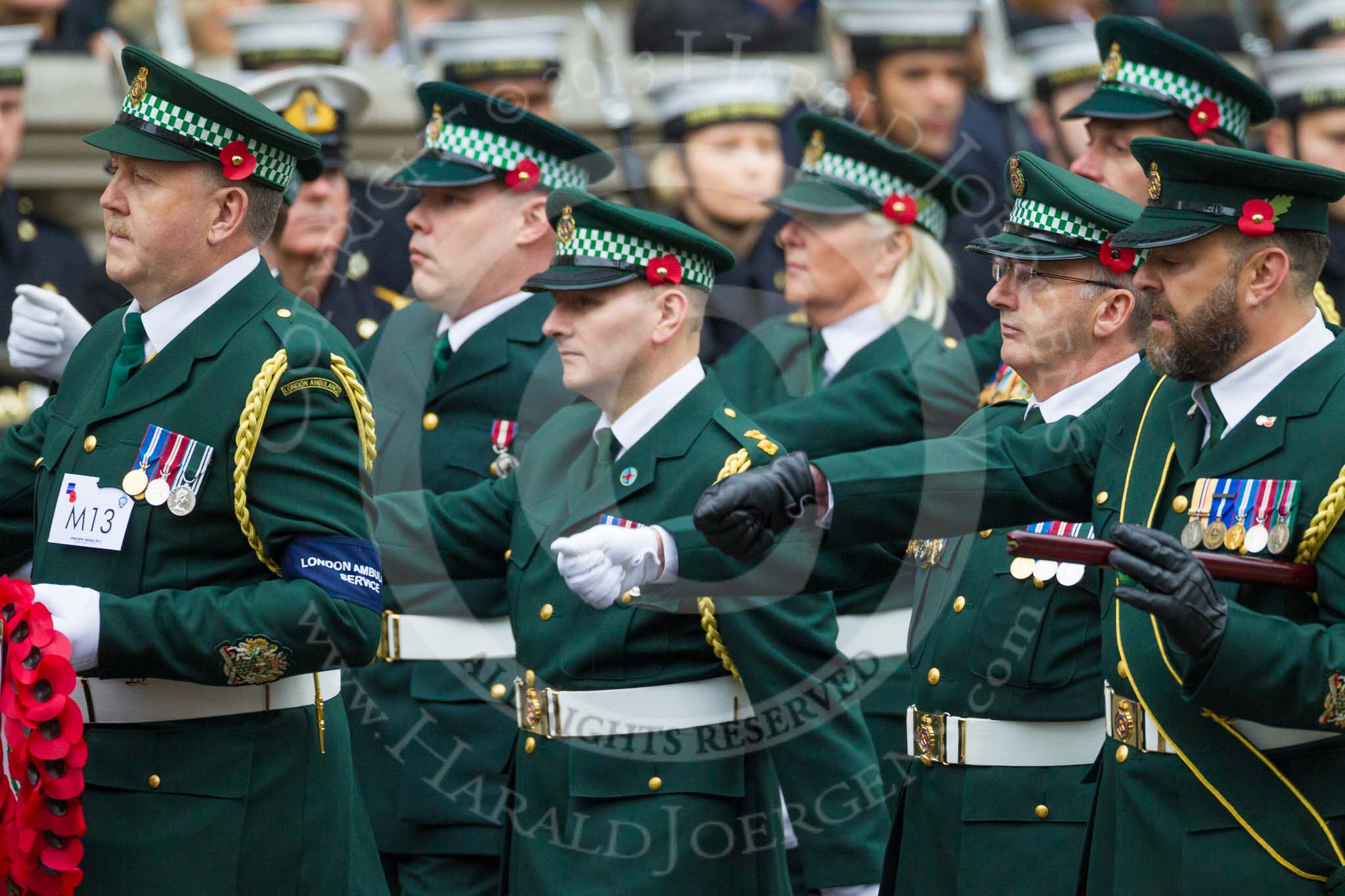 Remembrance Sunday at the Cenotaph 2015: Group M13, London Ambulance Service NHS Trust.
Cenotaph, Whitehall, London SW1,
London,
Greater London,
United Kingdom,
on 08 November 2015 at 12:16, image #1492