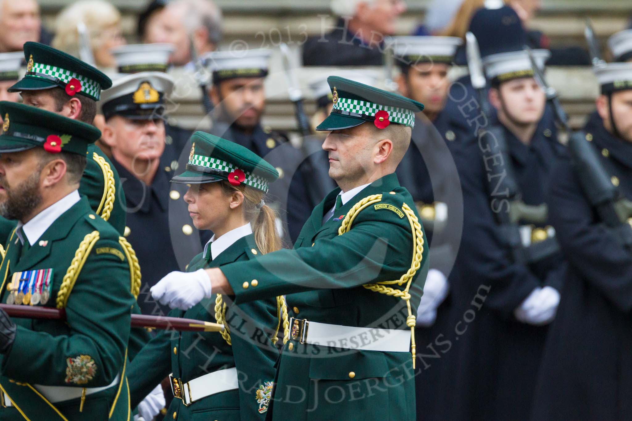 Remembrance Sunday at the Cenotaph 2015: Group M13, London Ambulance Service NHS Trust.
Cenotaph, Whitehall, London SW1,
London,
Greater London,
United Kingdom,
on 08 November 2015 at 12:16, image #1494
