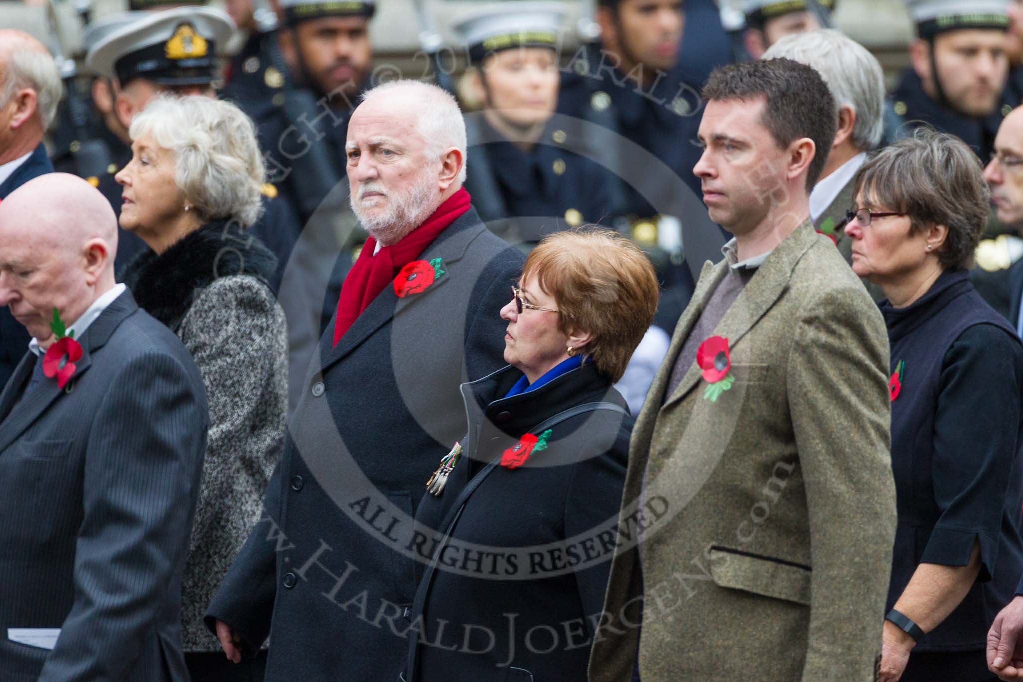 Remembrance Sunday at the Cenotaph 2015: Group M23, Civilians Representing Families.
Cenotaph, Whitehall, London SW1,
London,
Greater London,
United Kingdom,
on 08 November 2015 at 12:17, image #1563