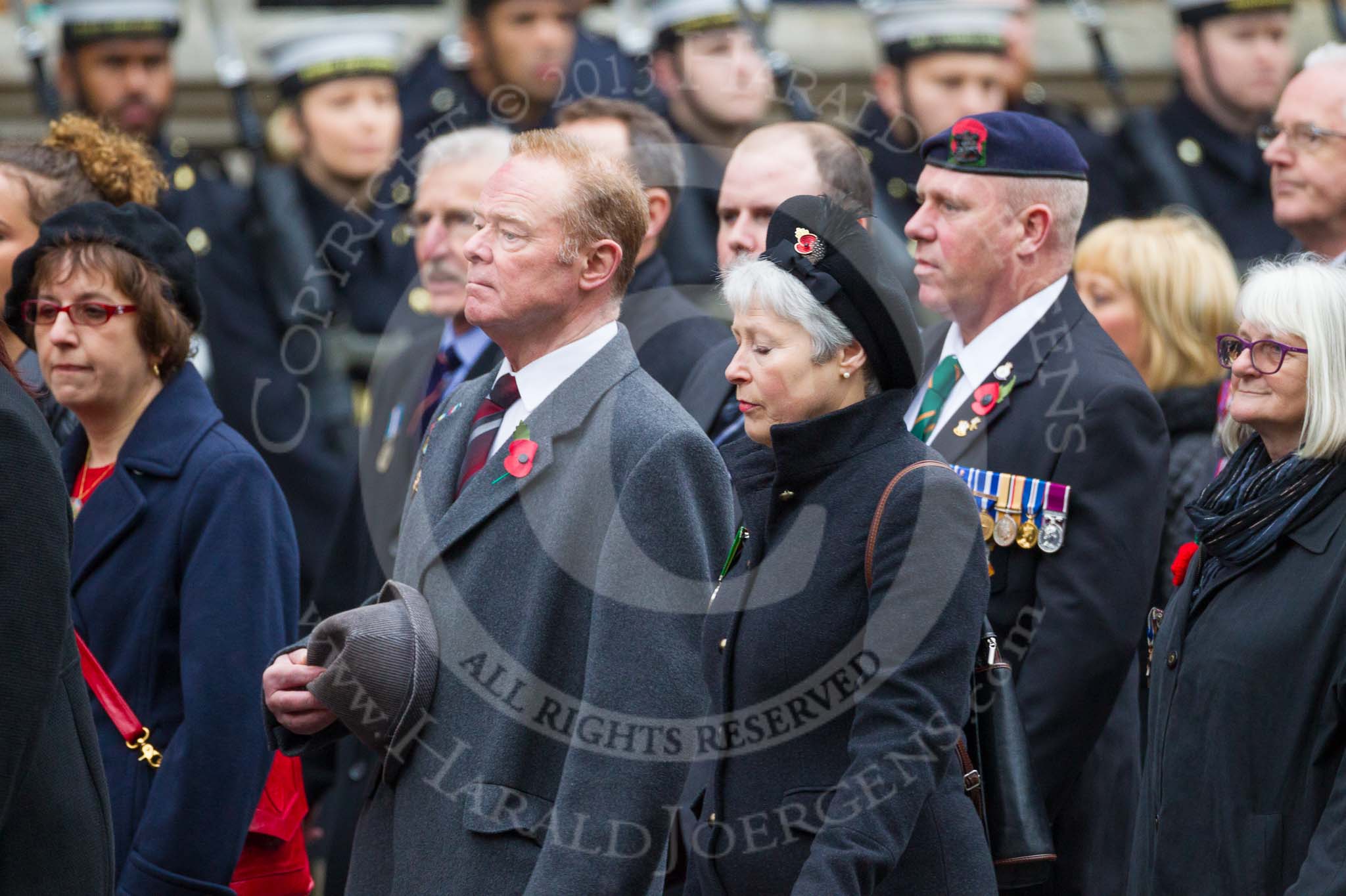 Remembrance Sunday at the Cenotaph 2015: Group M23, Civilians Representing Families.
Cenotaph, Whitehall, London SW1,
London,
Greater London,
United Kingdom,
on 08 November 2015 at 12:17, image #1582