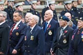 Remembrance Sunday at the Cenotaph 2015: Group F16, National Gulf Veterans & Families Association.
Cenotaph, Whitehall, London SW1,
London,
Greater London,
United Kingdom,
on 08 November 2015 at 12:06, image #1088