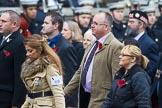 Remembrance Sunday at the Cenotaph 2015: Group M8, Naval Canteen Service & Expeditionary Force Institutes Association (previously NAAFI).
Cenotaph, Whitehall, London SW1,
London,
Greater London,
United Kingdom,
on 08 November 2015 at 12:15, image #1461