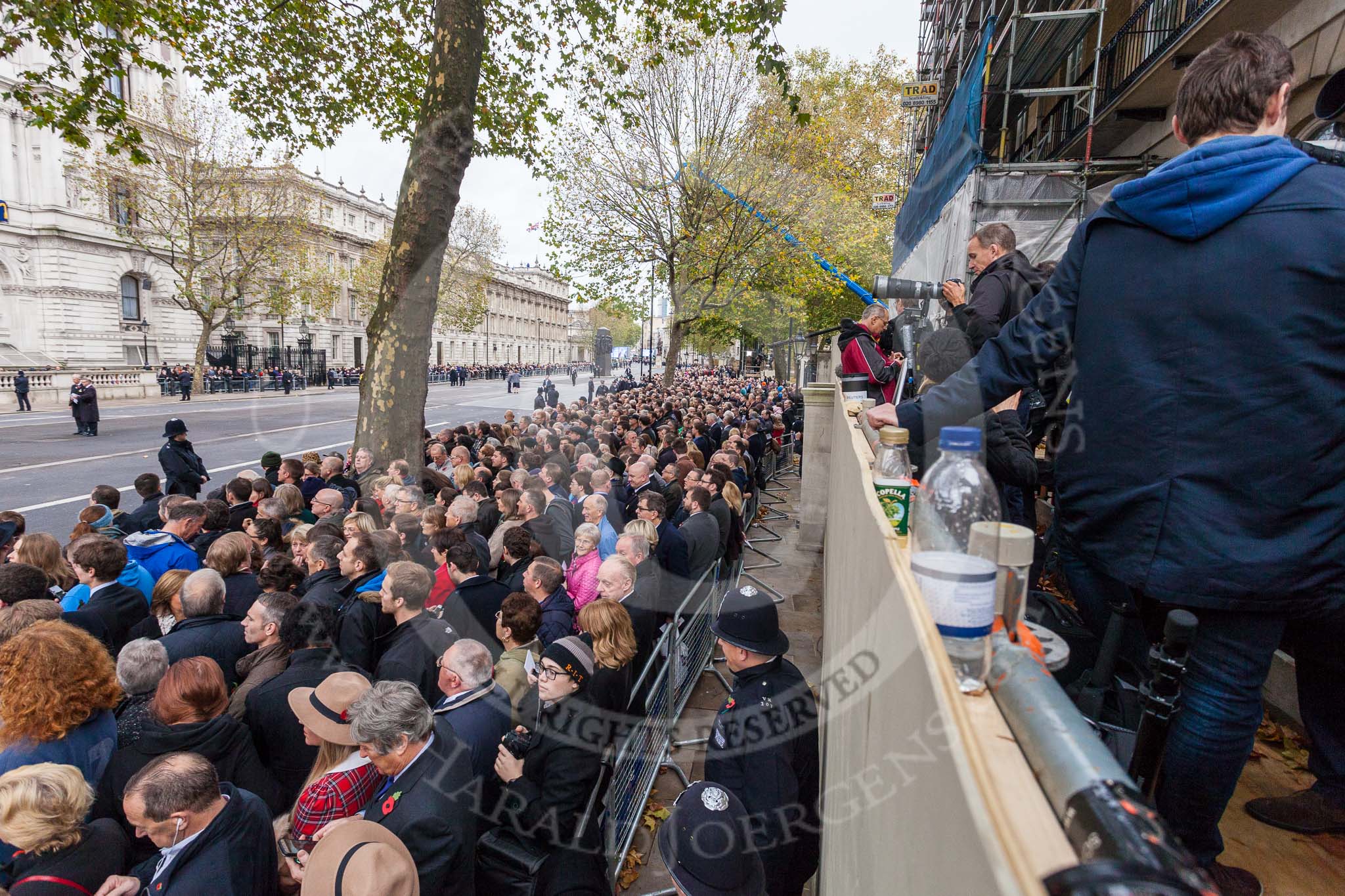 Remembrance Sunday at the Cenotaph 2015: Crowds at the Cenotaph an hour before the start of the event. Image #18, 08 November 2015 09:47 Whitehall, London, UK