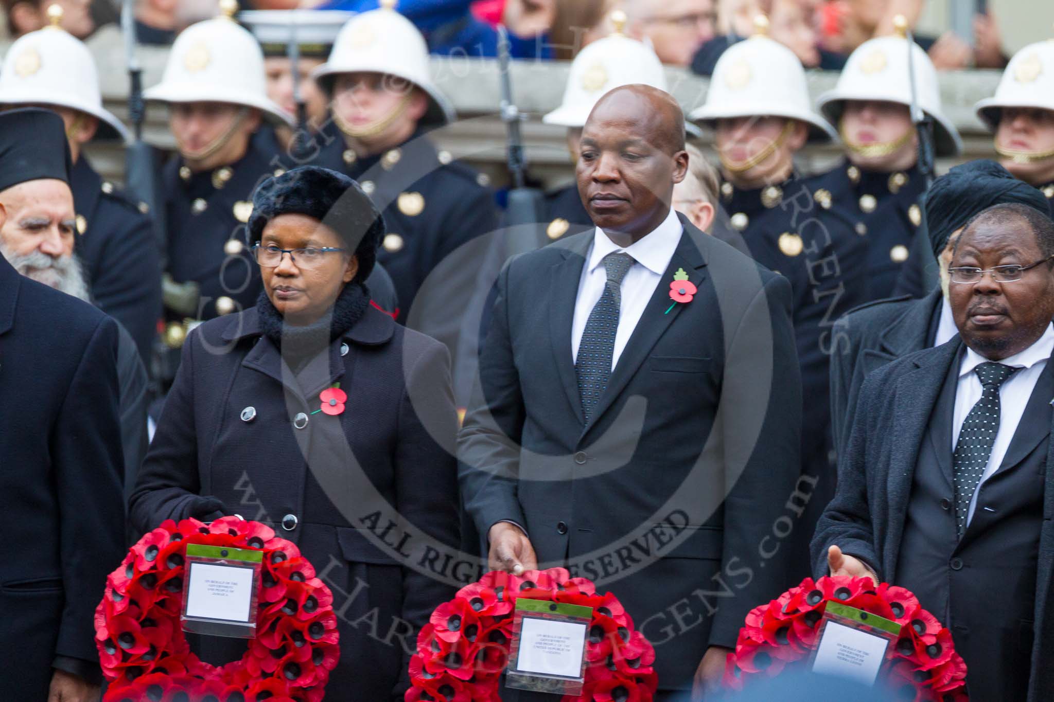 Remembrance Sunday at the Cenotaph 2015: The Minister Counsellor of Jamaica, the High Commissioner of Tanzania, and the Deputy High Commissioner of Sierra Leone with their wreaths at the Cenotaph. Image #111, 08 November 2015 10:57 Whitehall, London, UK