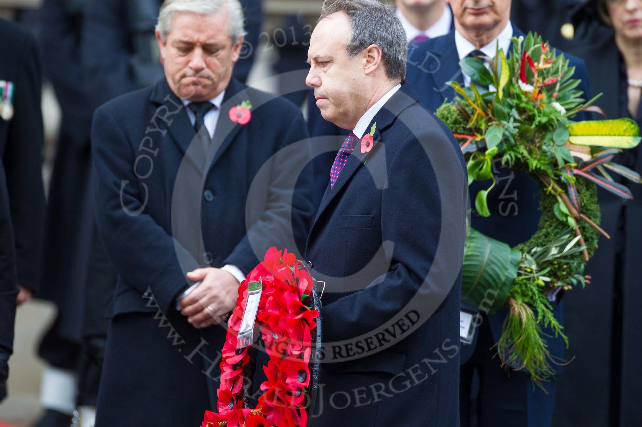 Remembrance Sunday at the Cenotaph 2015: The Westminster Democratic Unionist Party Leader, Nigel Dodds, walking towards the Cenotaph with his wreath. Image #219, 08 November 2015 11:07 Whitehall, London, UK