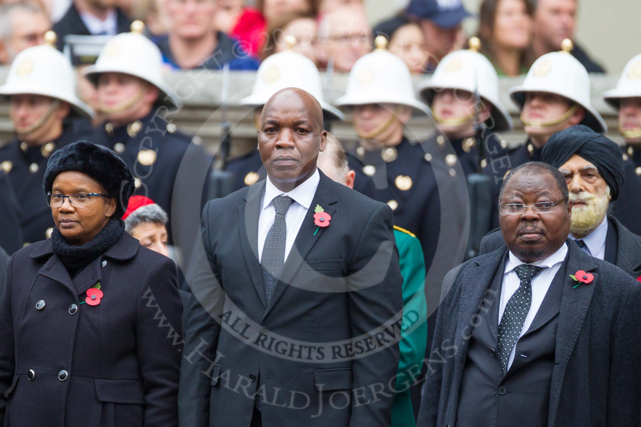Remembrance Sunday at the Cenotaph 2015: The Minister Counsellor of Jamaica, the High Commissioner of Tanzania, and the Acting High Commissioner of Sierra Leone standing at the Cenotaph. Image #311, 08 November 2015 11:19 Whitehall, London, UK