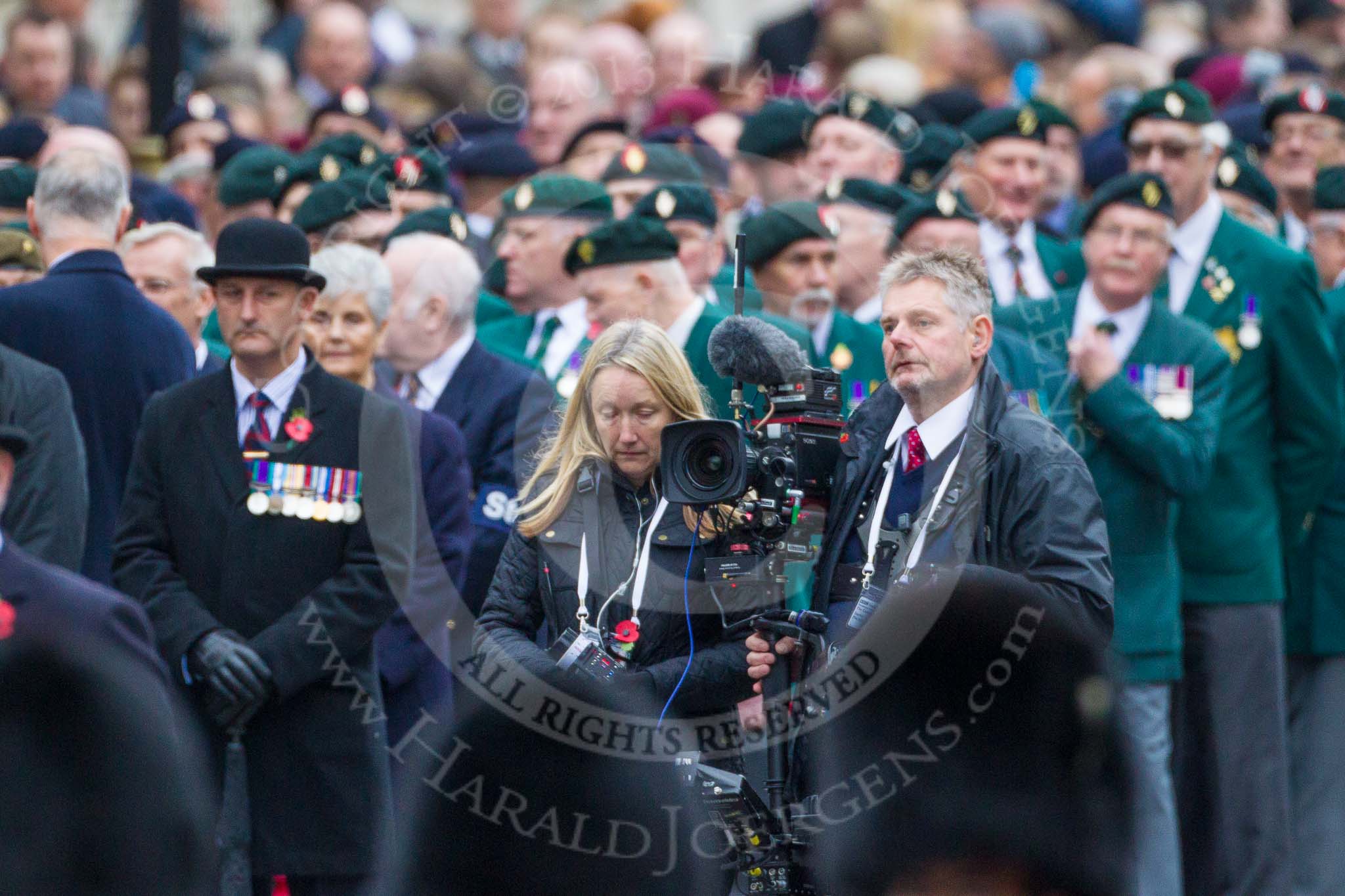 Remembrance Sunday at the Cenotaph 2015: The BBC Steadycam operator ready to film the veterans for the live broadcast during the March Past. Image #355, 08 November 2015 11:32 Whitehall, London, UK