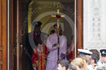 Remembrance Sunday at the Cenotaph 2015: The choir, led by the Cross Bearer, Jason Panagiotopoulos, is emerging from the Foreign- and Commonwealth Office Building, followed by the 10 Children of the Chapel Royal. Image #72, 08 November 2015 10:51 Whitehall, London, UK