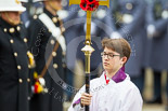 Remembrance Sunday at the Cenotaph 2015: The choir is led by the Cross Bearer, Jason Panagiotopoulos. Image #81, 08 November 2015 10:54 Whitehall, London, UK