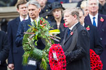 Remembrance Sunday at the Cenotaph 2015: The Westminster Leader of the Scottish National Party, Angus Robertson, walking towards the Cenotaph with his wreath. Image #215, 08 November 2015 11:07 Whitehall, London, UK