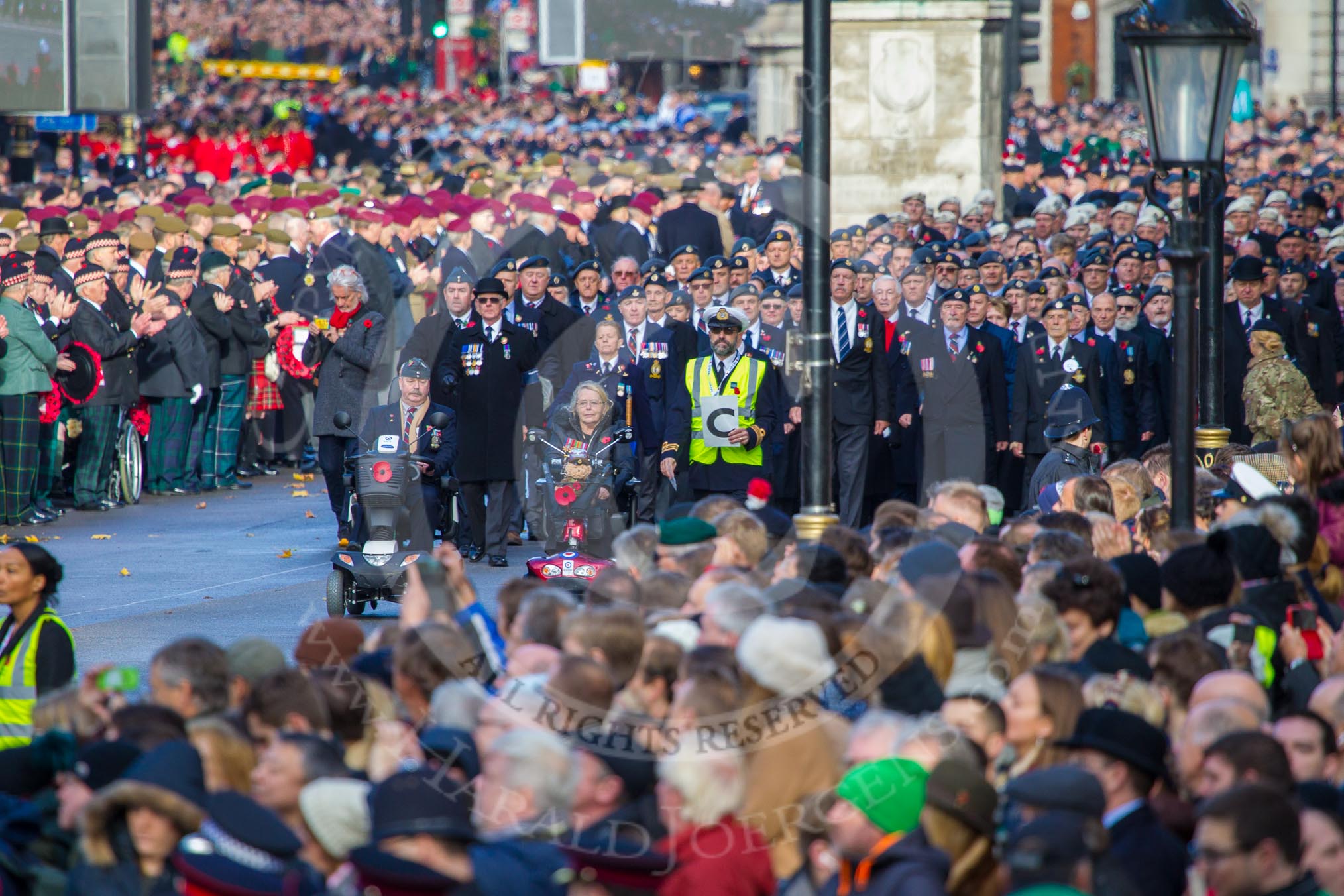 Column C of the March Past arrives on Whitehall after a long wait on Horse Guards Parade before the Remembrance Sunday Cenotaph Ceremony 2018 at Horse Guards Parade, Westminster, London, 11 November 2018, 10:42.