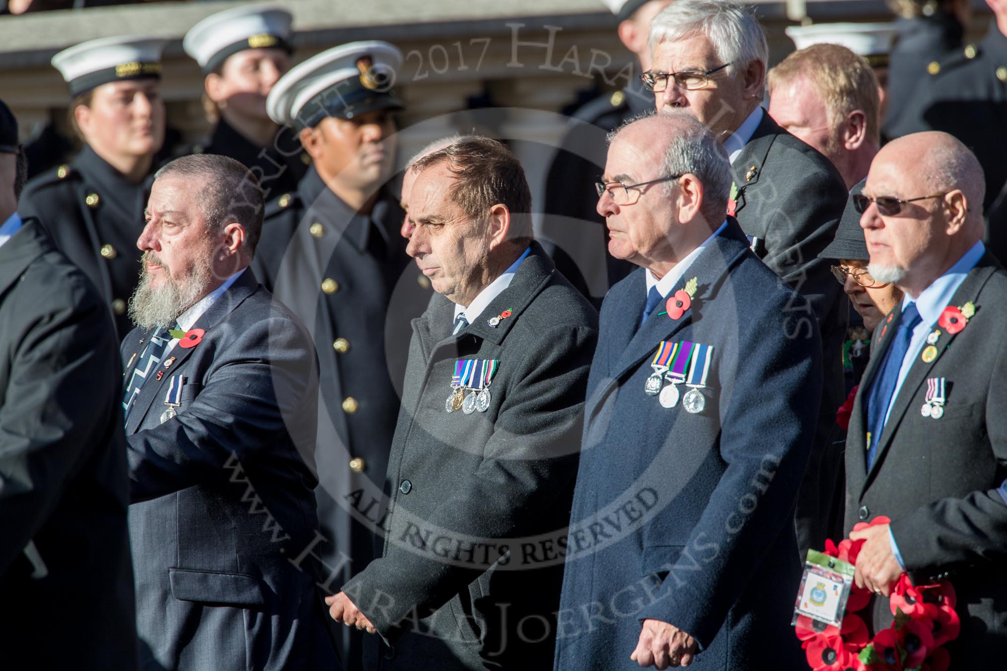 Fleet Air Arm Safety Equipment & Survival Association  (Group E14, 22 members) during the Royal British Legion March Past on Remembrance Sunday at the Cenotaph, Whitehall, Westminster, London, 11 November 2018, 11:43.