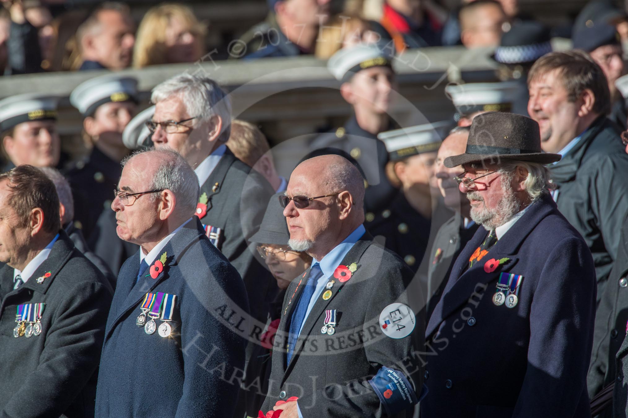 Fleet Air Arm Safety Equipment & Survival Association  (Group E14, 22 members) during the Royal British Legion March Past on Remembrance Sunday at the Cenotaph, Whitehall, Westminster, London, 11 November 2018, 11:43.