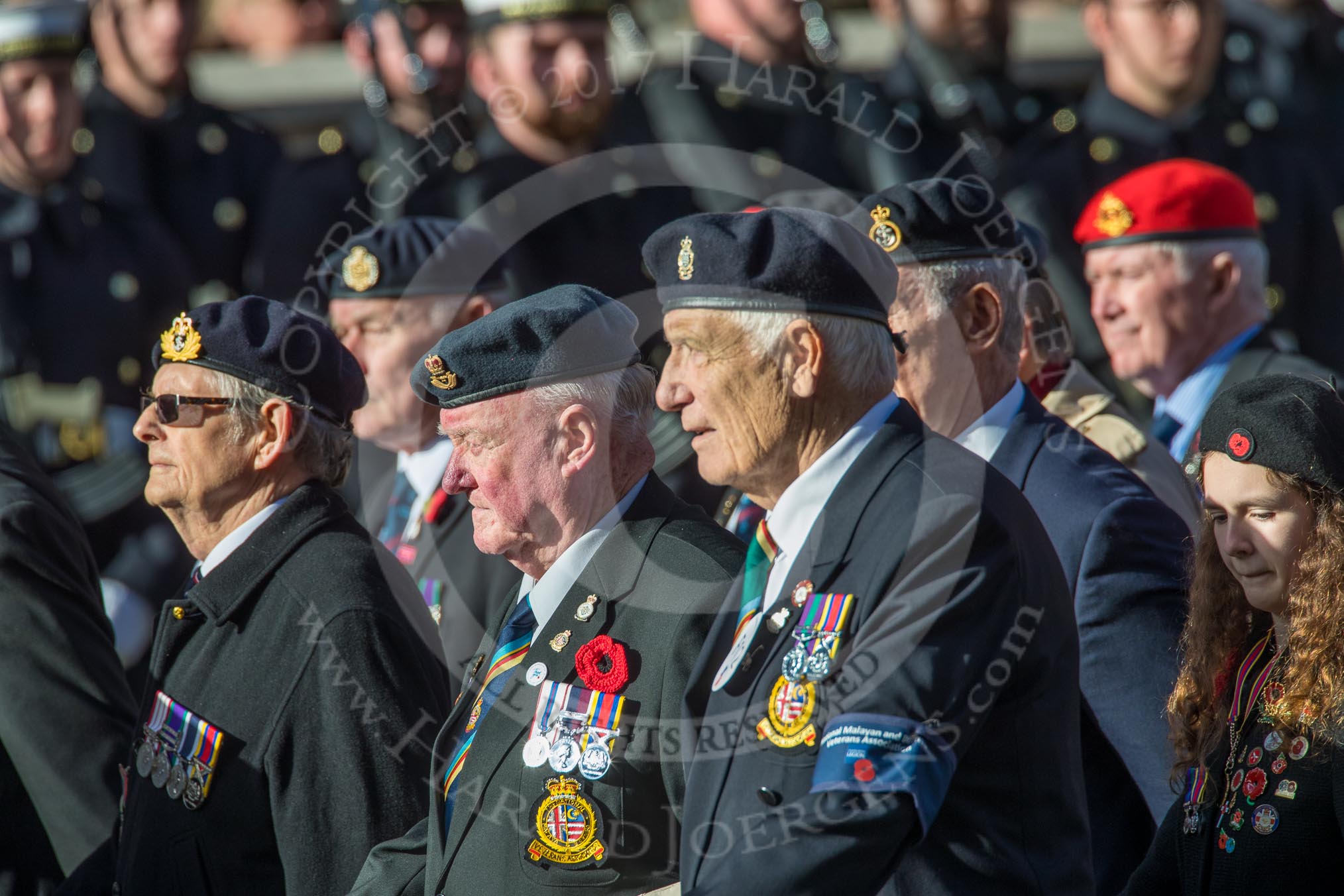 National Malay and Borneo Veterans Association  (Group F12, 76 members) during the Royal British Legion March Past on Remembrance Sunday at the Cenotaph, Whitehall, Westminster, London, 11 November 2018, 11:51.