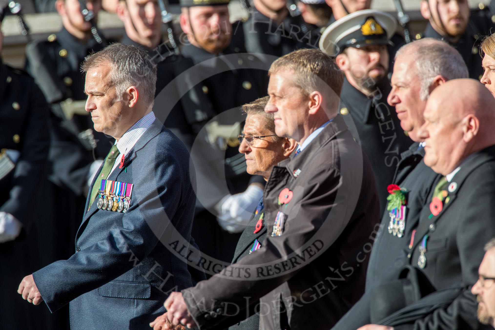 The Cheshire and North Wales Volunteer Decoration and Long Service Medallist’s Association (Group F29, 24 members) during the Royal British Legion March Past on Remembrance Sunday at the Cenotaph, Whitehall, Westminster, London, 11 November 2018, 11:54.