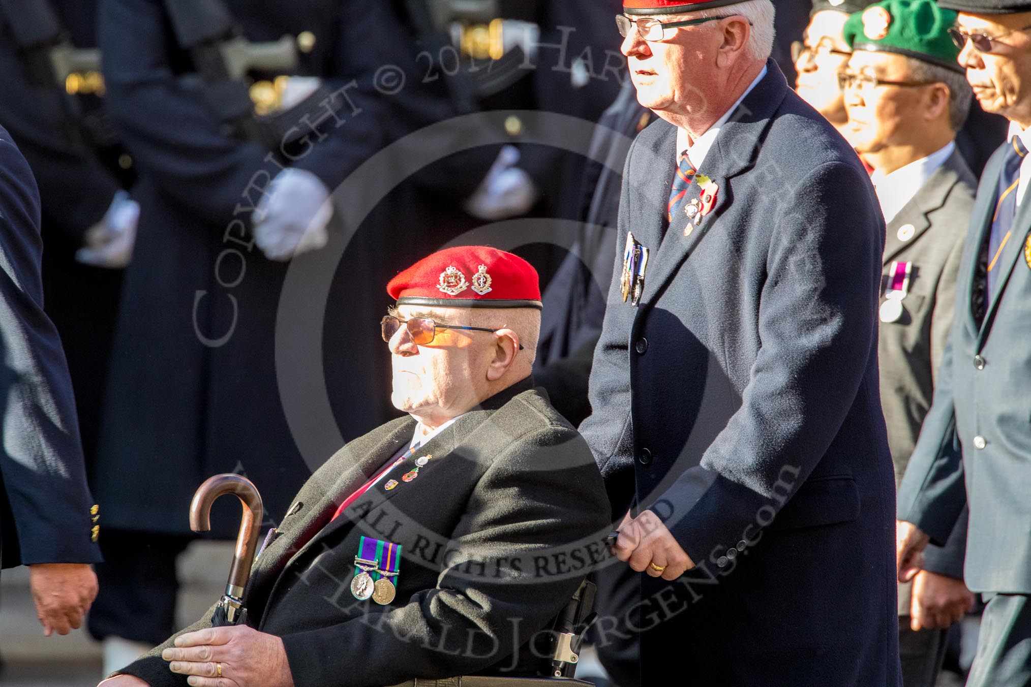 The Hong Kong Ex-Servicemen's Association  (UK Branch) (Group D22, 24 members) during the Royal British Legion March Past on Remembrance Sunday at the Cenotaph, Whitehall, Westminster, London, 11 November 2018, 12:24.