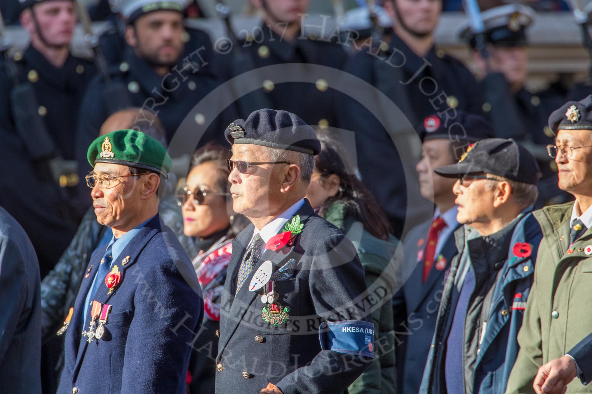 The Hong Kong Ex-Servicemen's Association  (UK Branch) (Group D22, 24 members) during the Royal British Legion March Past on Remembrance Sunday at the Cenotaph, Whitehall, Westminster, London, 11 November 2018, 12:24.