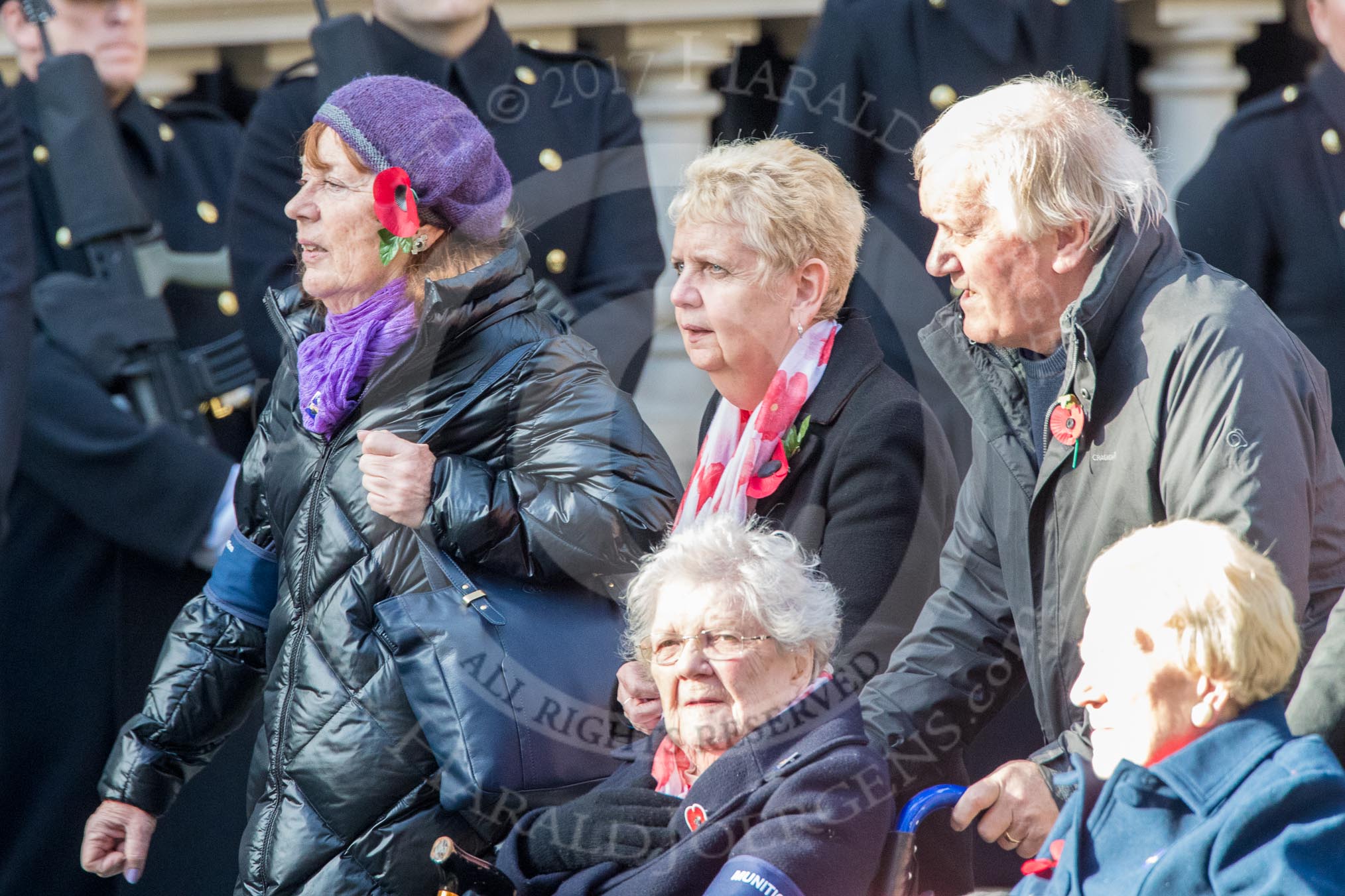 Munitions Workers Association (Group M3, 21 members) during the Royal British Legion March Past on Remembrance Sunday at the Cenotaph, Whitehall, Westminster, London, 11 November 2018, 12:25.