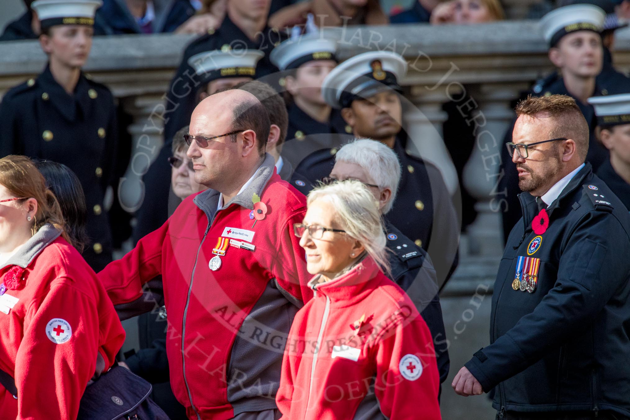 British Red Cross (Group M13, 15 members) during the Royal British Legion March Past on Remembrance Sunday at the Cenotaph, Whitehall, Westminster, London, 11 November 2018, 12:26.