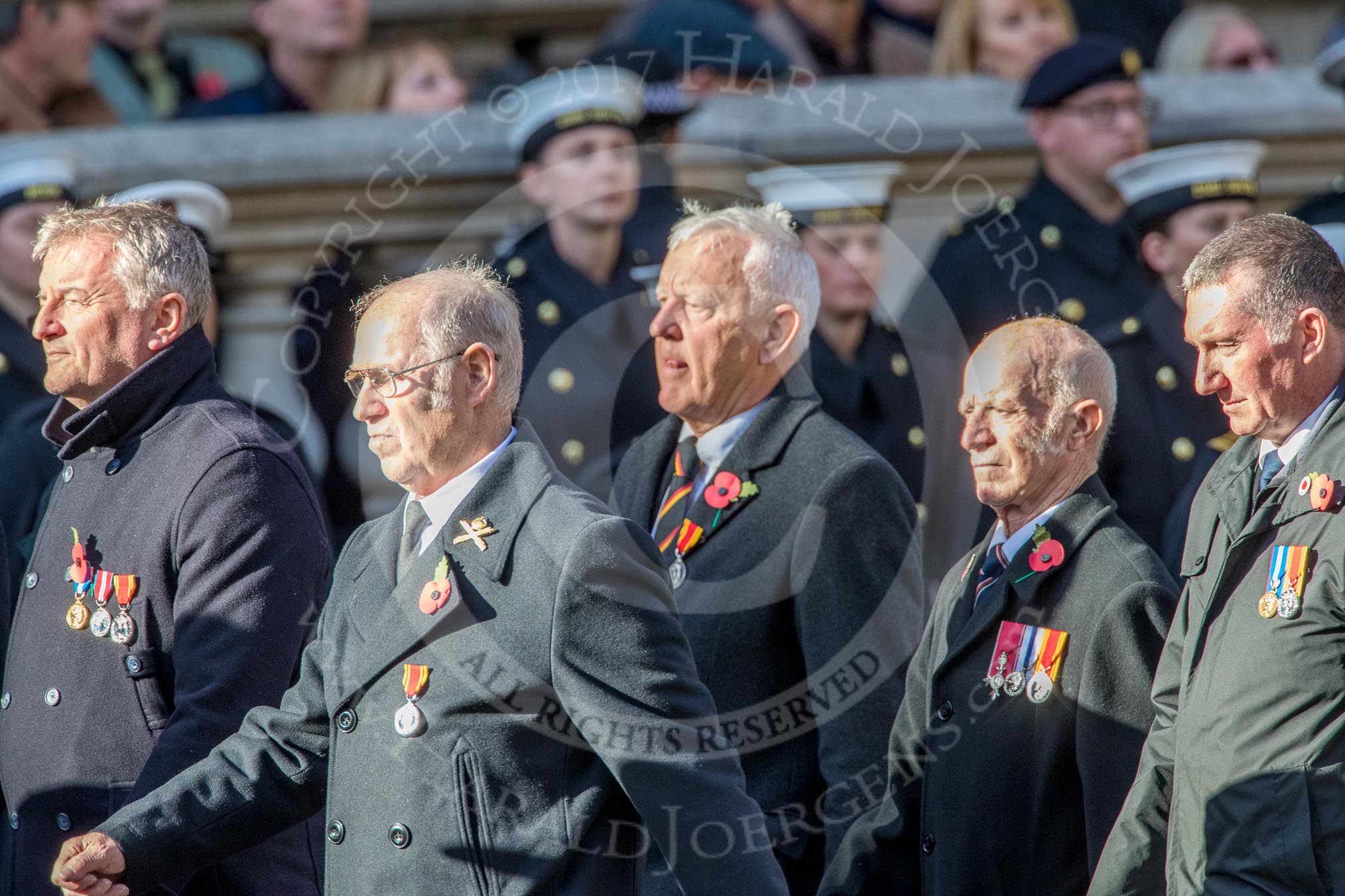 The Firefighters Memorial Trust (Group M16, 25 members) during the Royal British Legion March Past on Remembrance Sunday at the Cenotaph, Whitehall, Westminster, London, 11 November 2018, 12:26.