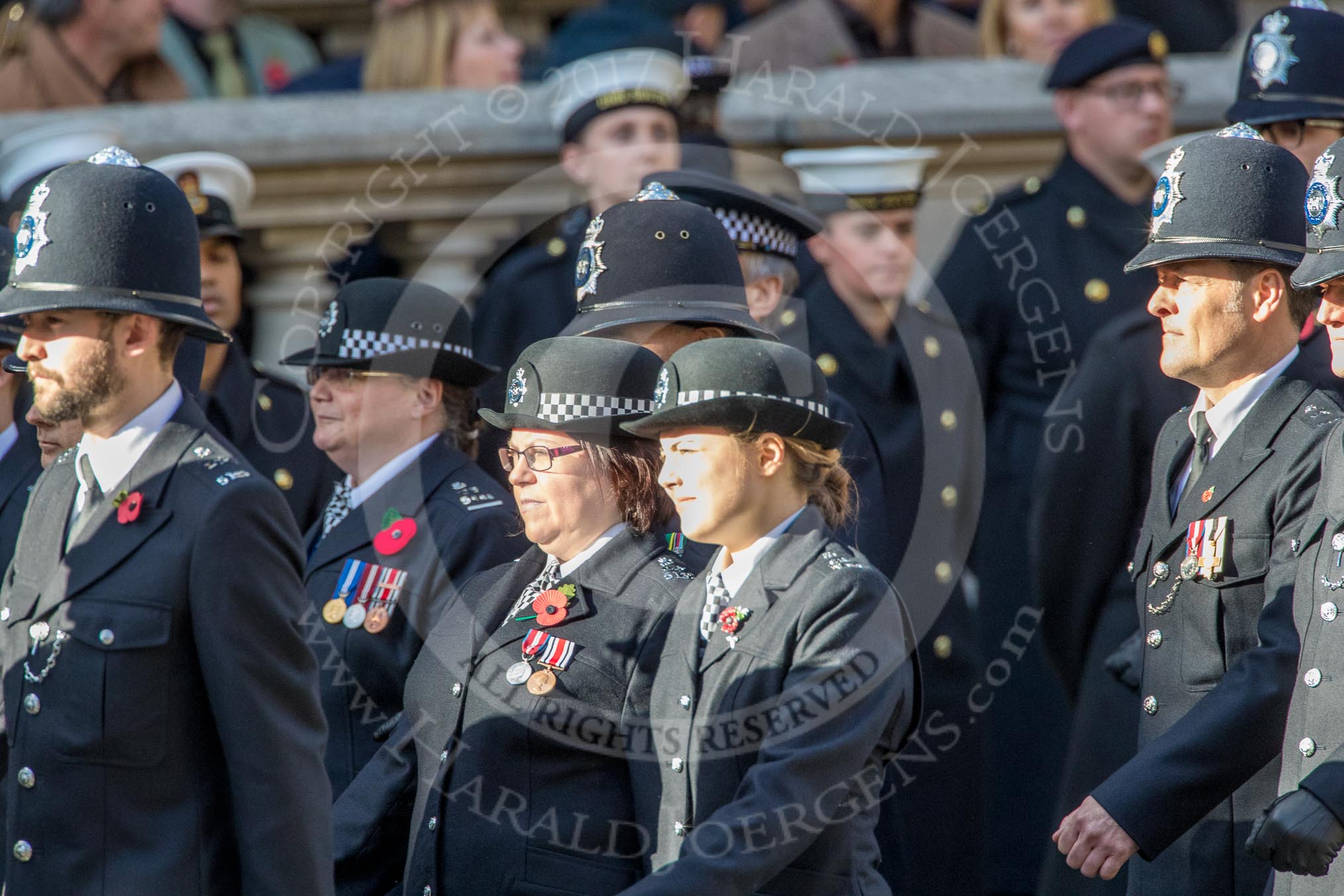 Metropolitan Special Constabulary (Group M17, 40 members) during the Royal British Legion March Past on Remembrance Sunday at the Cenotaph, Whitehall, Westminster, London, 11 November 2018, 12:27.