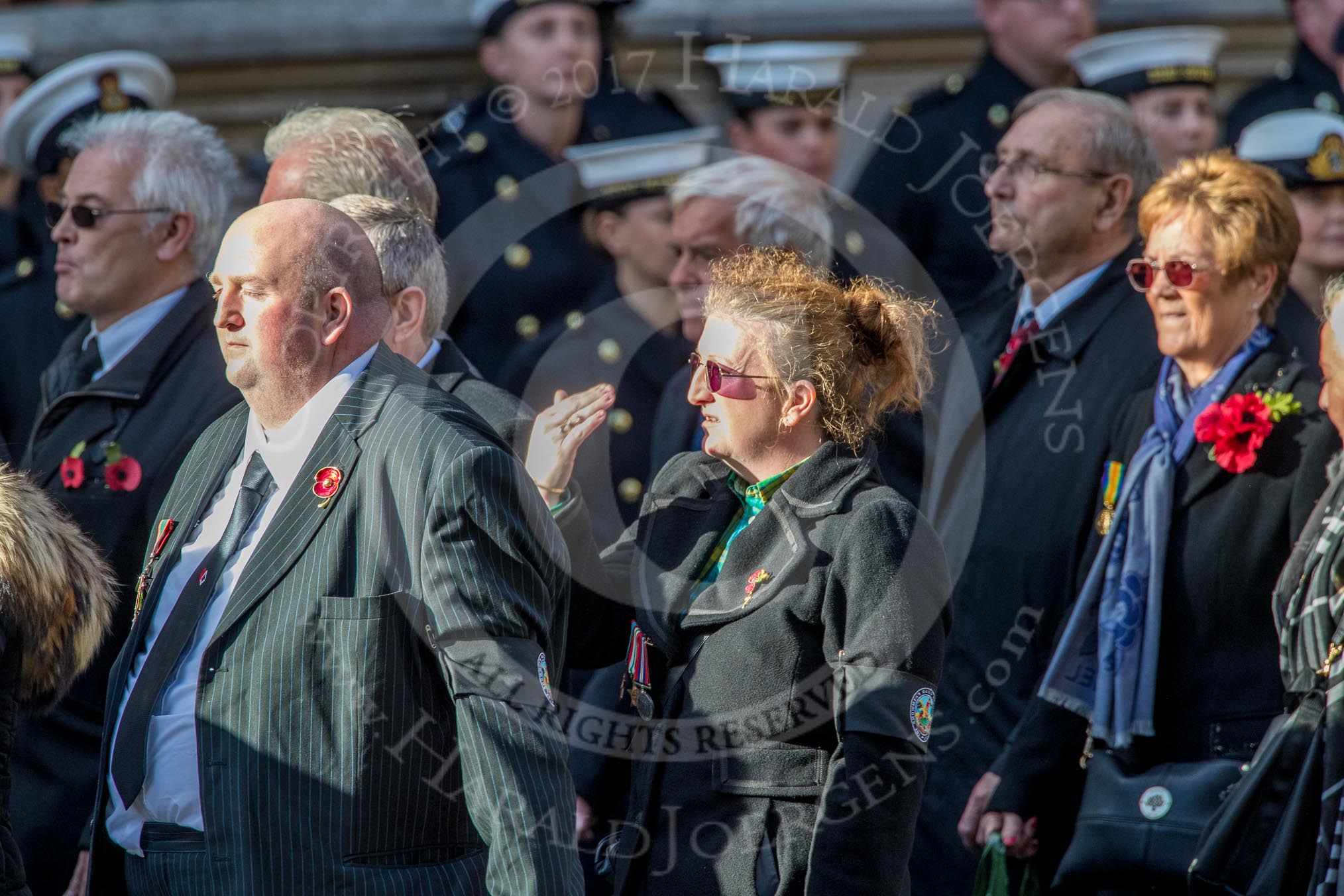 The Showmen's Guild of Great Britain (Group M18, 26 members) during the Royal British Legion March Past on Remembrance Sunday at the Cenotaph, Whitehall, Westminster, London, 11 November 2018, 12:27.