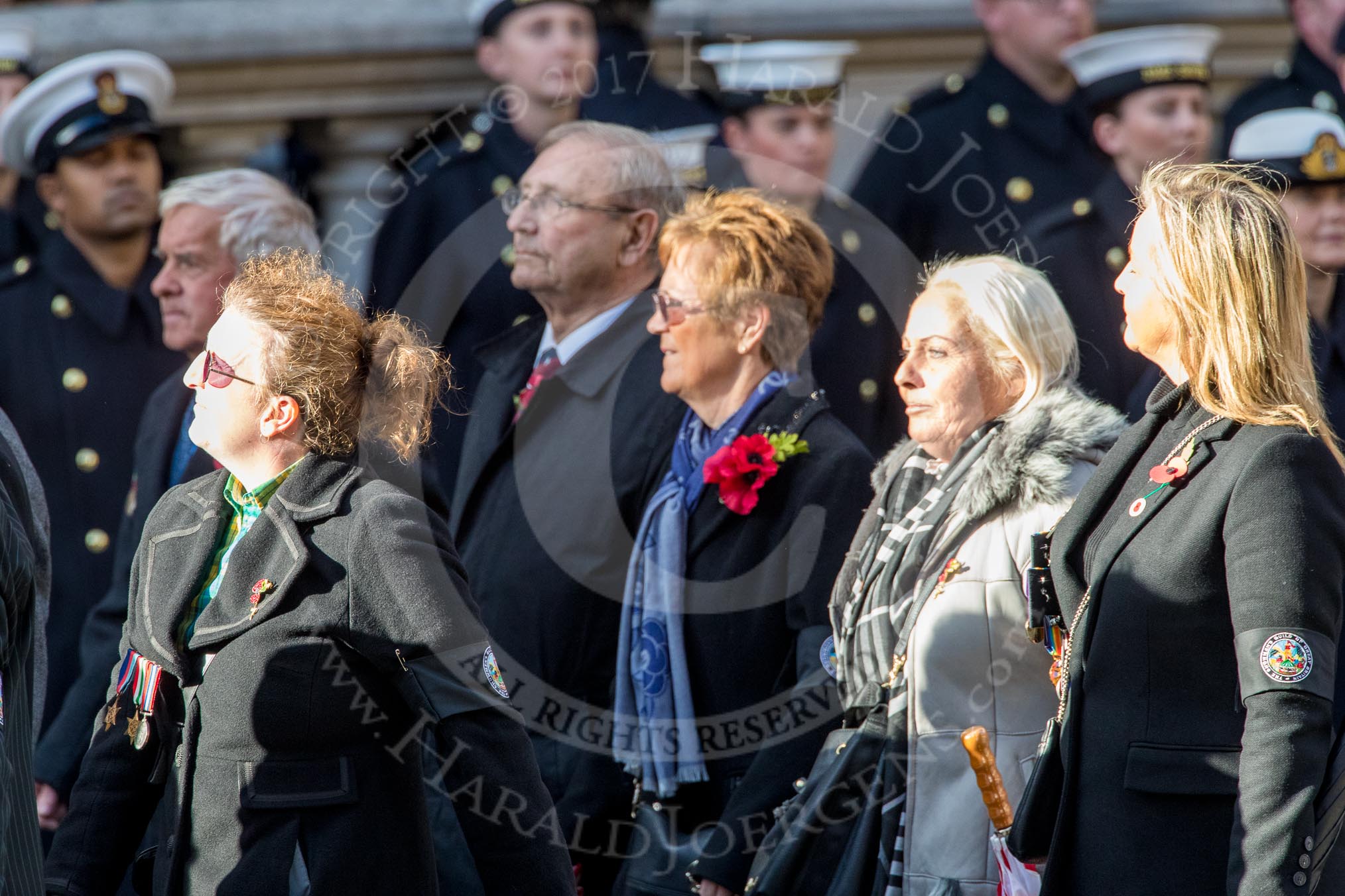 The Showmen's Guild of Great Britain (Group M18, 26 members) during the Royal British Legion March Past on Remembrance Sunday at the Cenotaph, Whitehall, Westminster, London, 11 November 2018, 12:27.