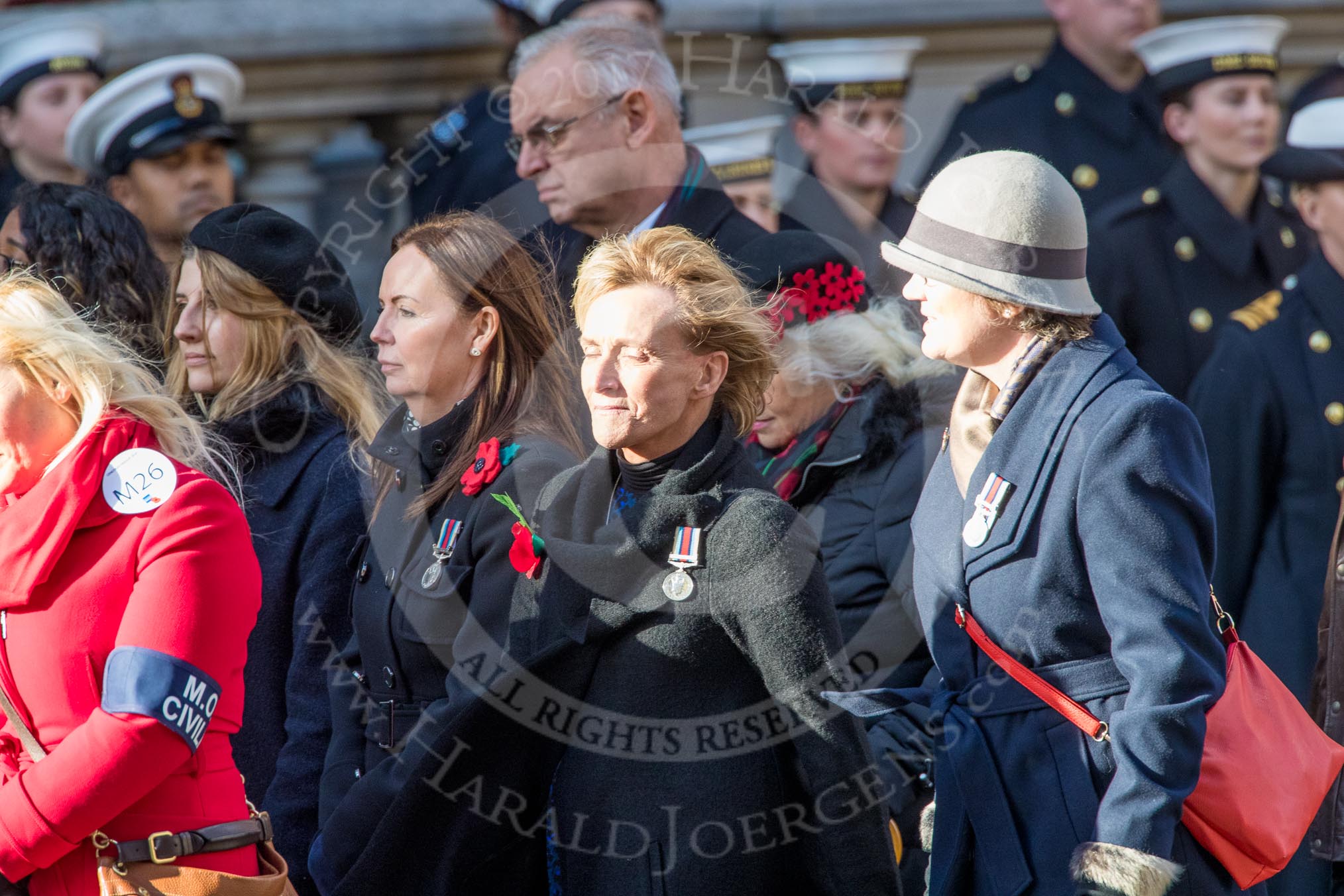 MOD Civilians (Group M26, 17 members) during the Royal British Legion March Past on Remembrance Sunday at the Cenotaph, Whitehall, Westminster, London, 11 November 2018, 12:28.