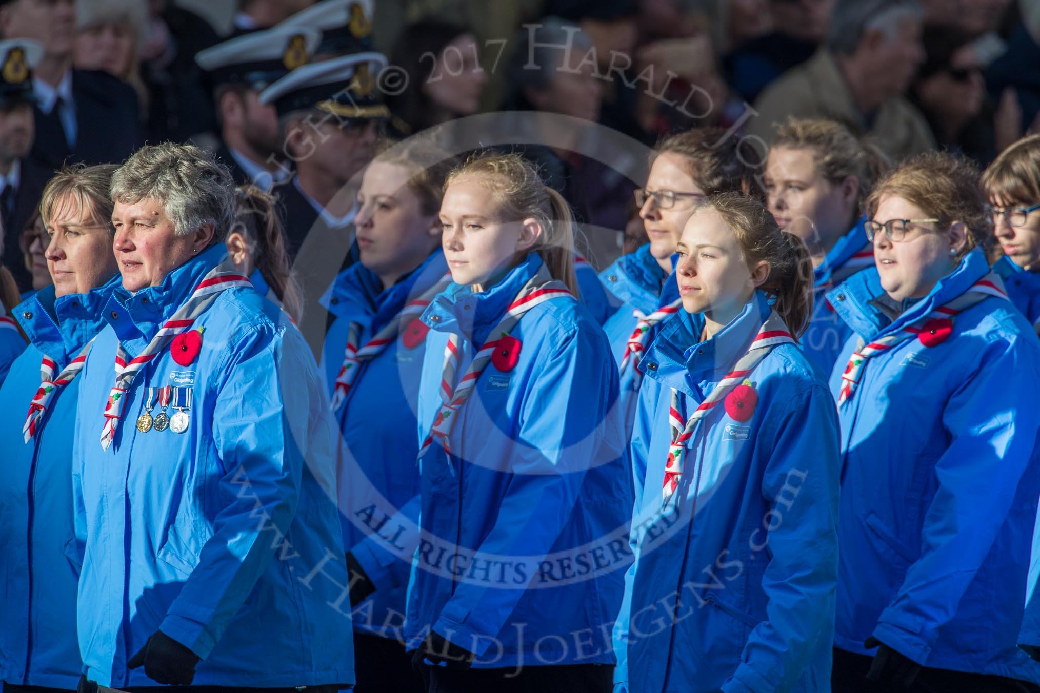 Girlguiding London and South East England(Group M38, 40 members) during the Royal British Legion March Past on Remembrance Sunday at the Cenotaph, Whitehall, Westminster, London, 11 November 2018, 12:30.