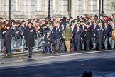The first column of veterans is marching from Horse Guards Parade onto Whitehall before the Remembrance Sunday Cenotaph Ceremony 2018 at Horse Guards Parade, Westminster, London, 11 November 2018, 10:08.