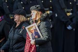 Children (and Families) of Far East Prisoners of War (Group M2, 59 members) during the Royal British Legion March Past on Remembrance Sunday at the Cenotaph, Whitehall, Westminster, London, 11 November 2018, 12:25.