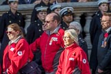 British Red Cross (Group M13, 15 members) during the Royal British Legion March Past on Remembrance Sunday at the Cenotaph, Whitehall, Westminster, London, 11 November 2018, 12:26.