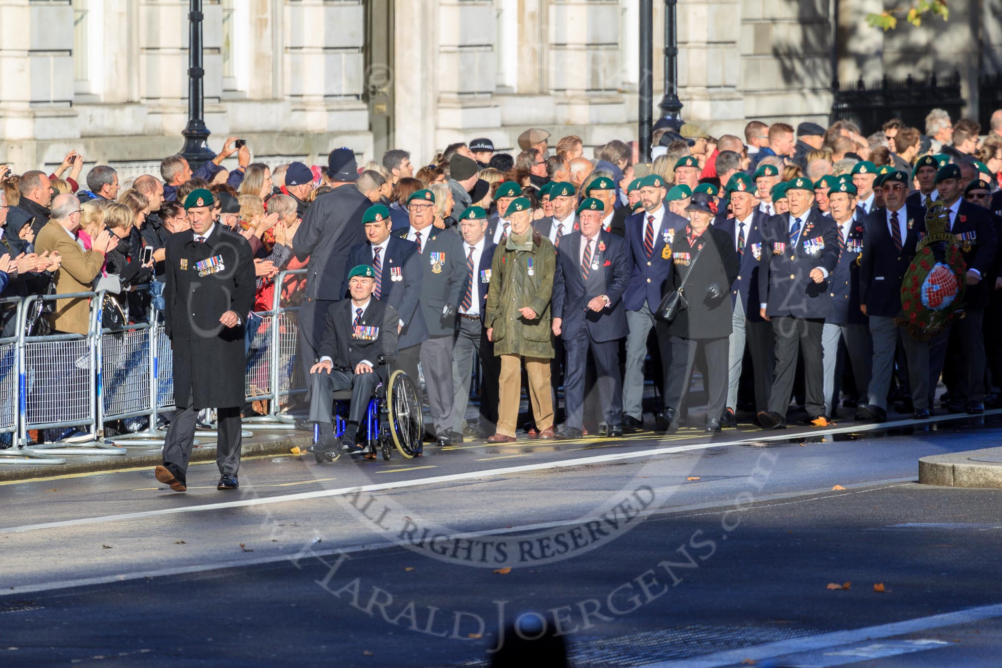 The first column of veterans is marching from Horse Guards Parade onto Whitehall before the Remembrance Sunday Cenotaph Ceremony 2018 at Horse Guards Parade, Westminster, London, 11 November 2018, 10:08.