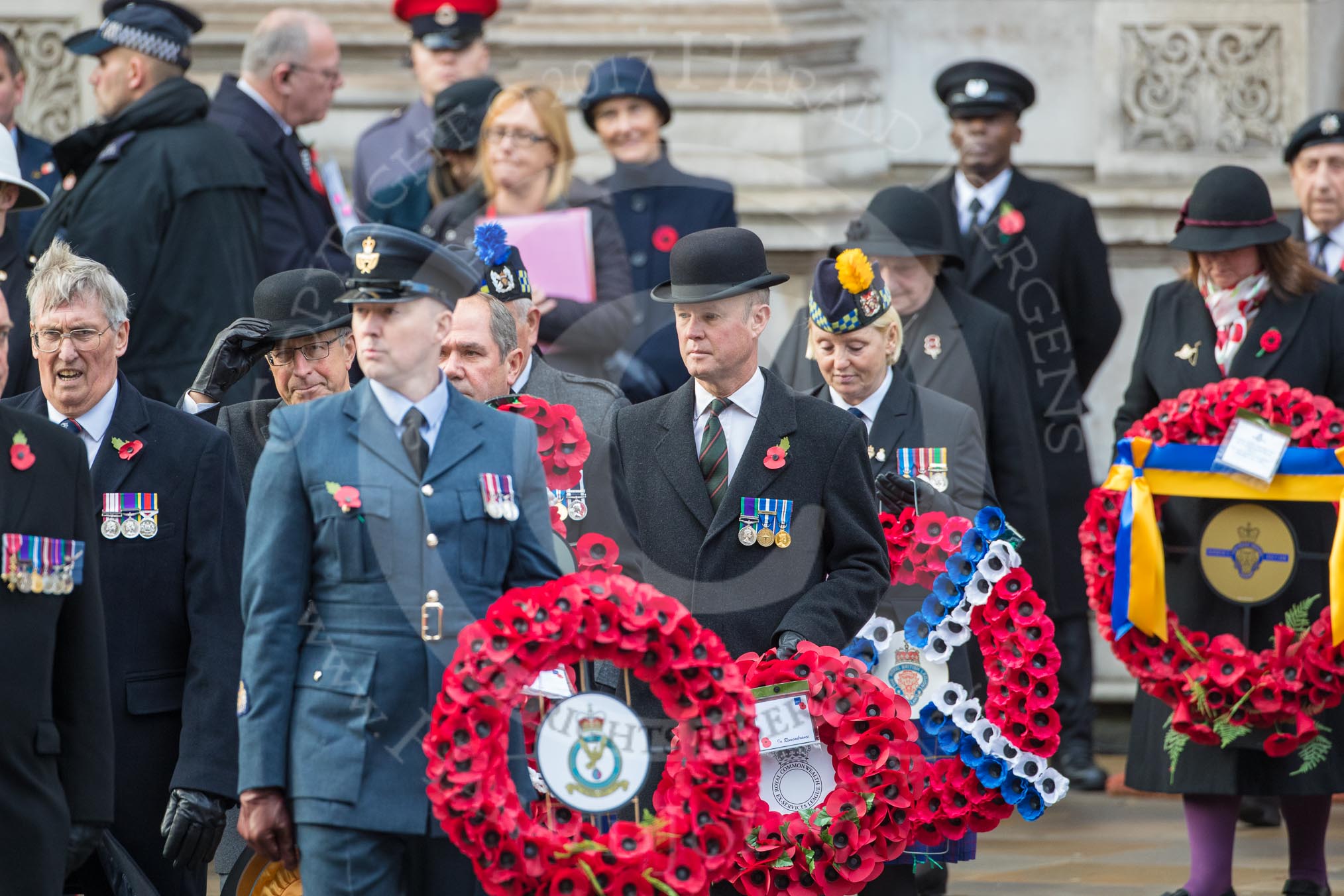Air Marshal Sir Baz North, President of the Royal Air Forces Association  and representatives of The Royal British Legion, London Transport, the Royal Naval Association , the Royal Commonwealth Ex­Services League, the Royal British Legion Scotland, and the Royal British Legion Women’s Section leaving the Foreign and Commonwealth Office before the Remembrance Sunday Cenotaph Ceremony 2018 at Horse Guards Parade, Westminster, London, 11 November 2018, 10:35.