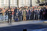 The first column of veterans is marching from Horse Guards Parade onto Whitehall before the Remembrance Sunday Cenotaph Ceremony 2018 at Horse Guards Parade, Westminster, London, 11 November 2018, 10:08.