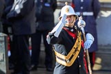 The Band of the Royal Marines drum major salutes the Cenotaph during Remembrance Sunday Cenotaph Ceremony 2018 at Horse Guards Parade, Westminster, London, 11 November 2018, 10:18.