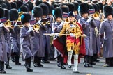 The third of the Massed Bands, the Band of the Irish Guards, led by Senior Drum Major Household Division, Damian Thomas, Grenadier Guards, arrives on Whitehall before the Remembrance Sunday Cenotaph Ceremony 2018 at Horse Guards Parade, Westminster, London, 11 November 2018, 10:27.