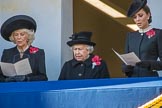 HRH The Duchess of Cornwall (Camilla), Her Majesty The Queen, and HRH The Duchess of Cambridge (Kate), singing, on the balcony of the Foreign and Commonwealth Office during the Remembrance Sunday Cenotaph Ceremony 2018 at Horse Guards Parade, Westminster, London, 11 November 2018, 11:18.