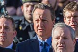 Former prime minister The Rt Hon David Cameron, singing, during Remembrance Sunday Cenotaph Ceremony 2018 at Horse Guards Parade, Westminster, London, 11 November 2018, 11:19.