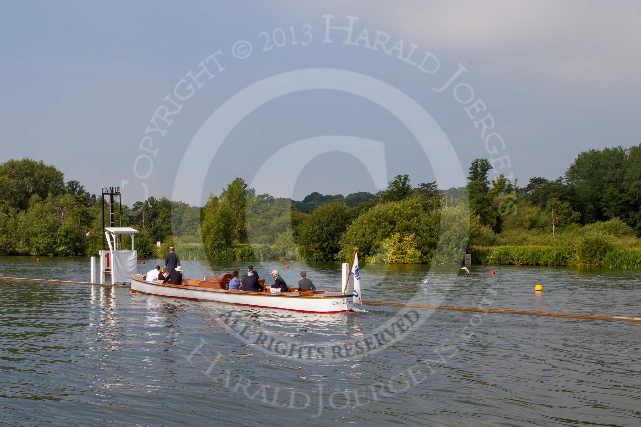 Henley Royal Regatta 2013, Saturday: Minutes before the Saturday races begin - a race official is dropped at the 1/4 mile marker. Image #59, 06 July 2013 09:44 River Thames, Henley on Thames, UK