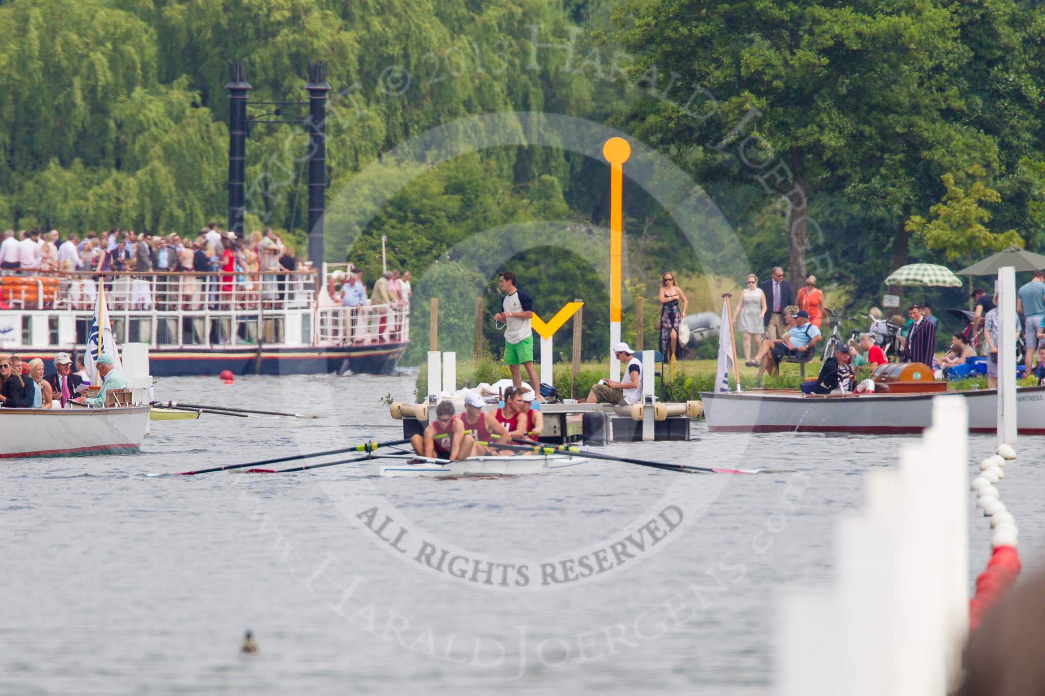 Henley Royal Regatta 2013, Saturday: Looking up to the start of the race course to the stake boats, umpire launches, and a passing paddle steamer packed with spectators. Image #296, 06 July 2013 12:21 River Thames, Henley on Thames, UK