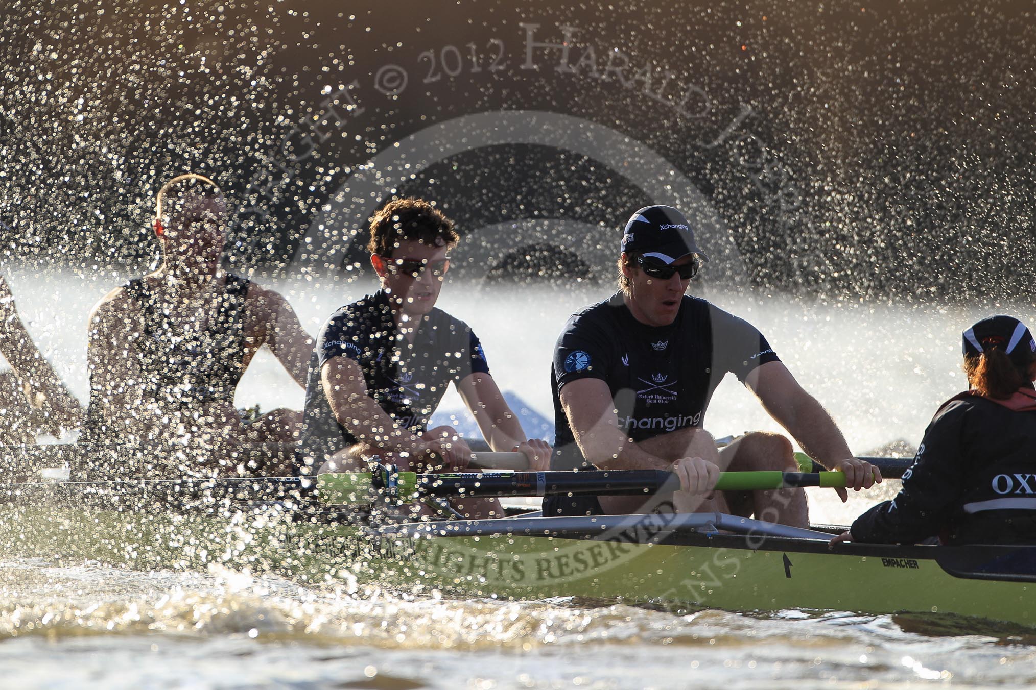 The Boat Race season 2012 - fixture OUBC vs German U23: Approaching the finish line of the second race, the Oxford Blue Boat, from left to right Alex Davidson, Dan Harvey, stern Roel Haen, and cox Zoe de Toledo..
River Thames between Putney and Mortlake,
London,

United Kingdom,
on 26 February 2012 at 15:46, image #90
