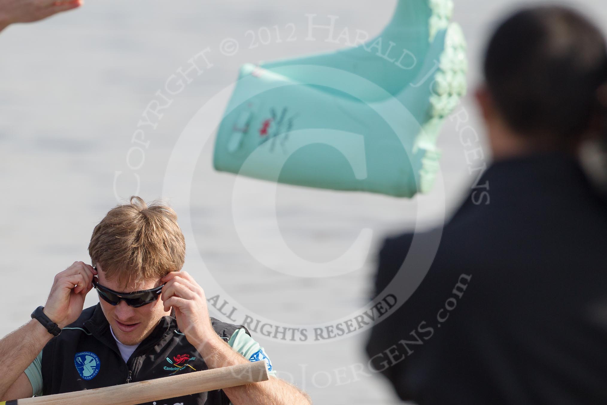 The Boat Race season 2012 - fixture CUBC vs Leander: CUBC president and 2 seat David Nelson and the flying boots..
River Thames between Putney and Molesey,
London,
Greater London,
United Kingdom,
on 10 March 2012 at 13:26, image #17