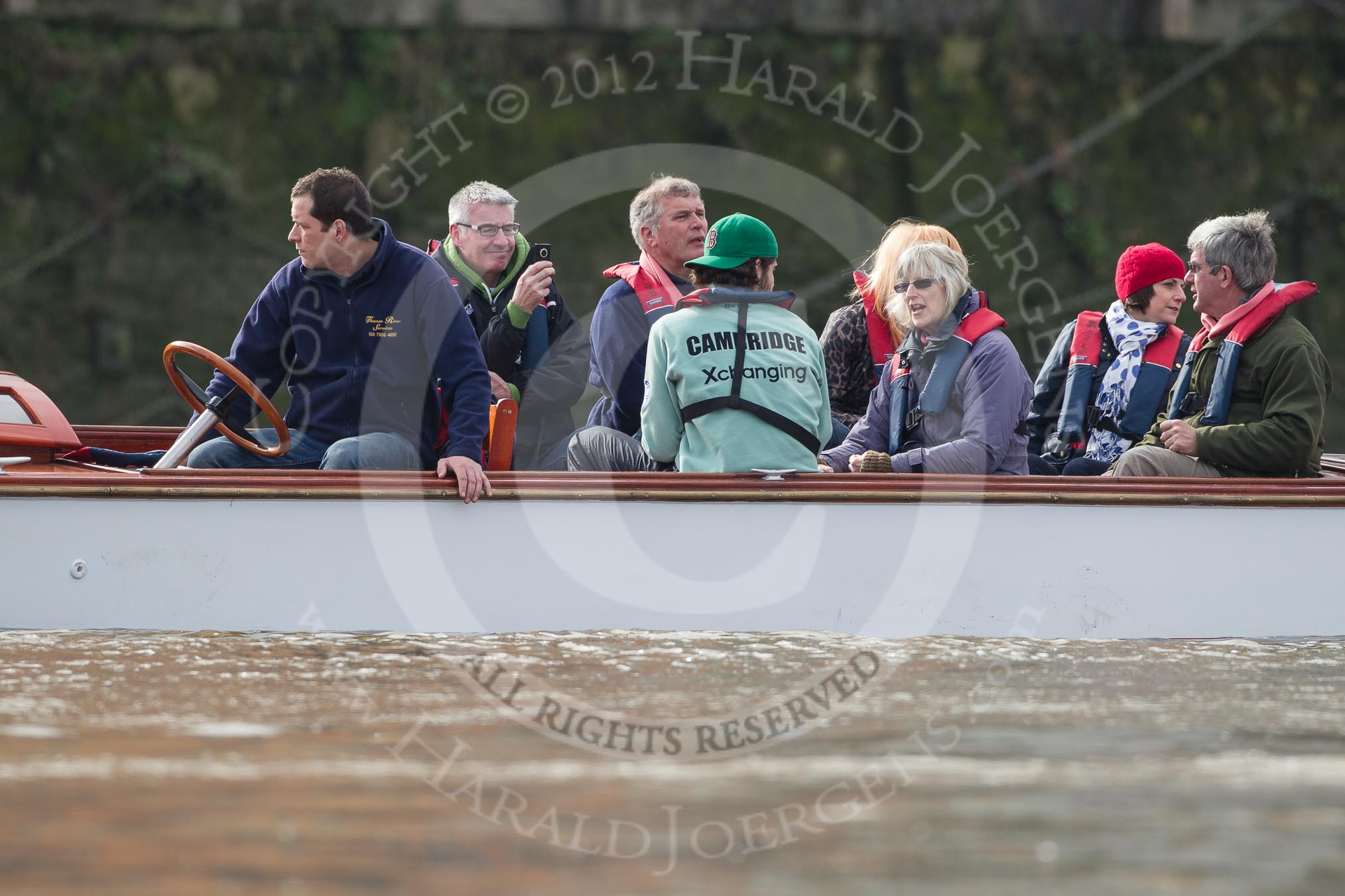 The Boat Race season 2012 - fixture CUBC vs Leander: Cambridge alumni watching the race..
River Thames between Putney and Molesey,
London,
Greater London,
United Kingdom,
on 10 March 2012 at 14:09, image #84