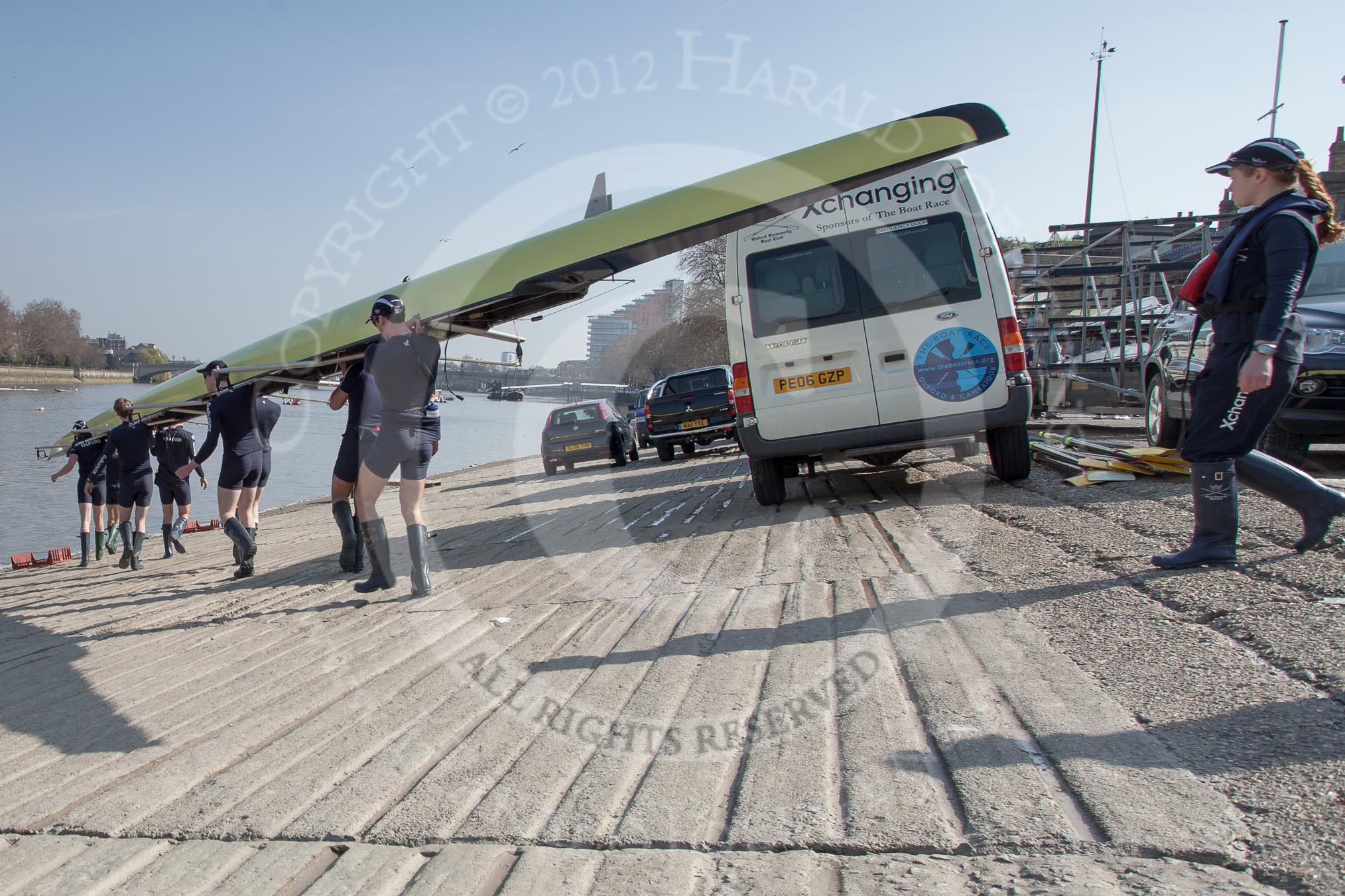 The Boat Race season 2012 - fixture OUBC vs Leander: The OUBC Isis crew getting ready for their race against Tideway Scullers, on the right of the Xchanging OUBC crew bus Oxford cox Katherine Apfelbaum..




on 24 March 2012 at 13:19, image #2